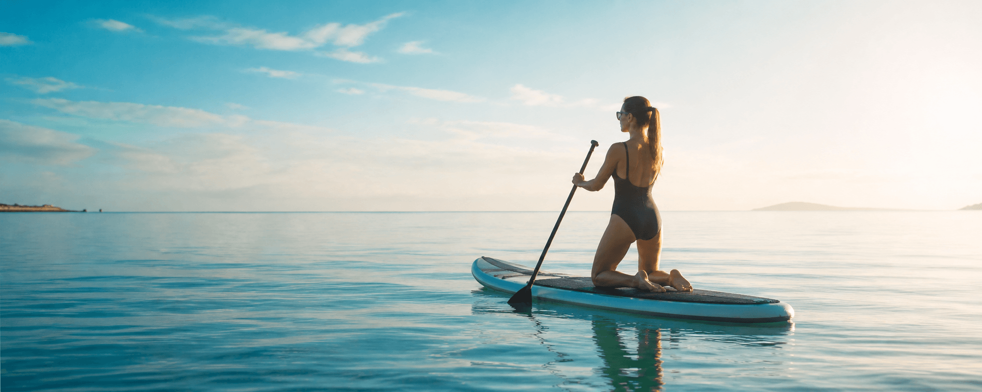 Frau auf einem SUP